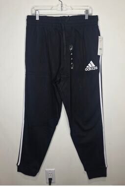 NWT Adidas black track pants with white stripes down side - large